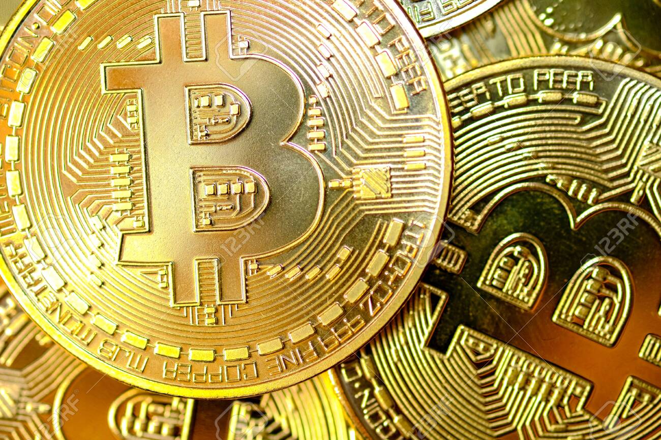 Close Up And Selective Focus A Group Of Golden Bitcoin A Virtual | Bitcoin online currency Close Up And Selective Focus A Group Of Golden Bitcoin A Virtual -